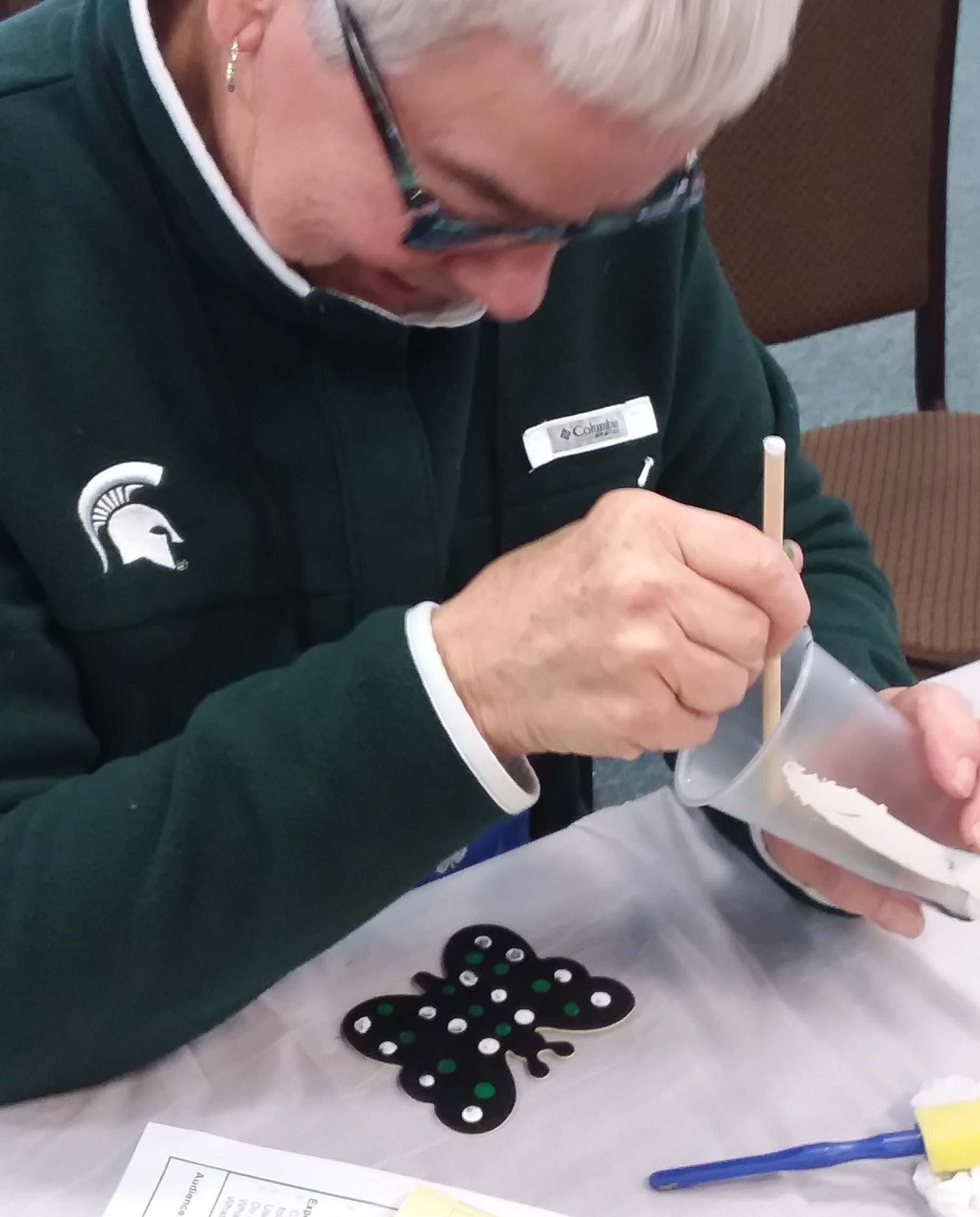 4-H leader making a craft